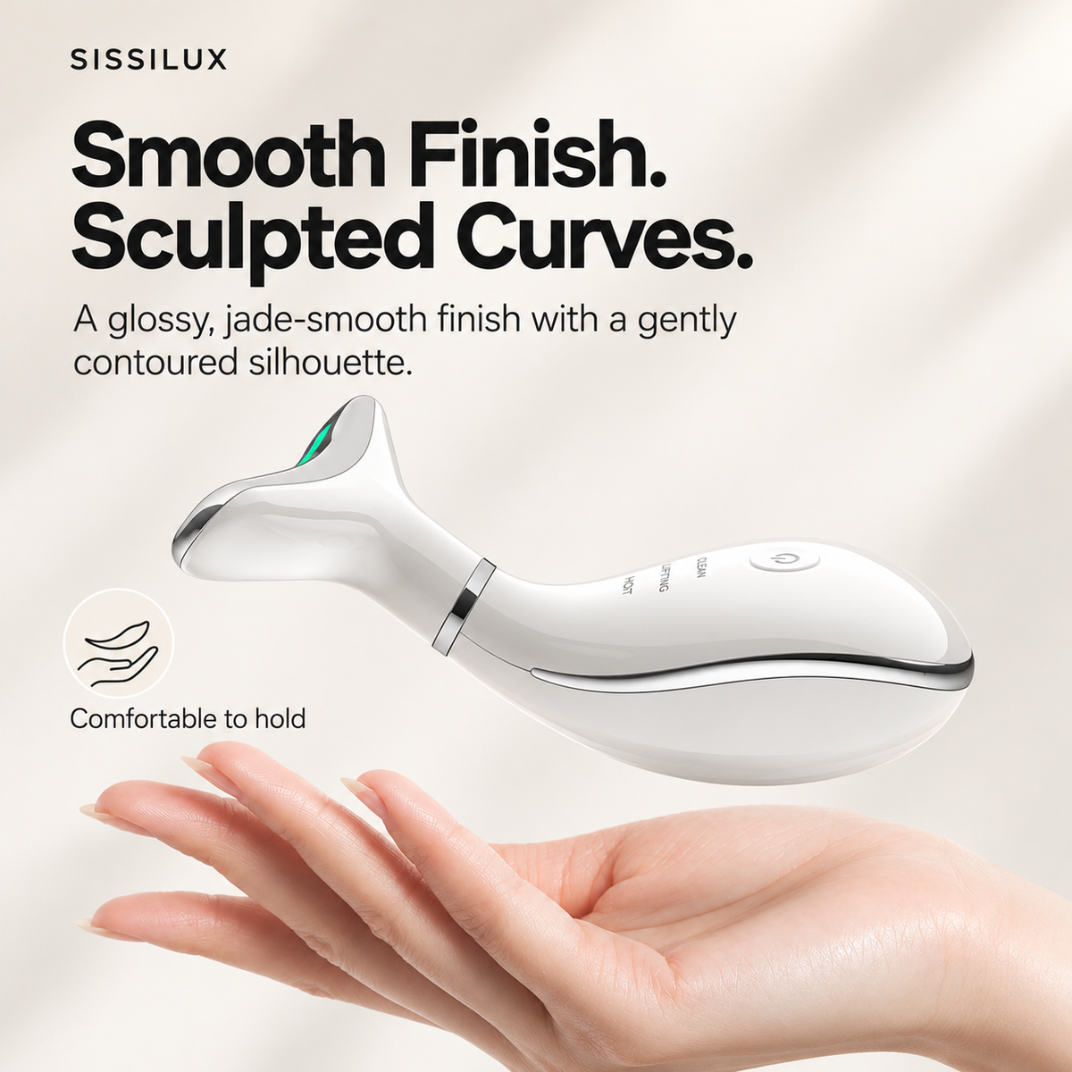White beauty wand side profile showing its smooth finish and sculpted curves above an open palm.