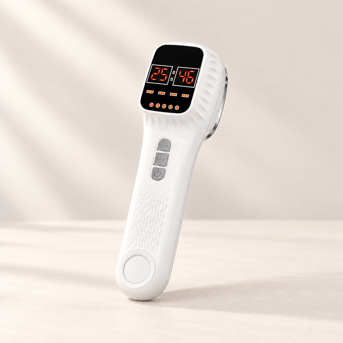 Control side of the SISSILUX handheld laser with digital display, intensity, timer and power buttons.